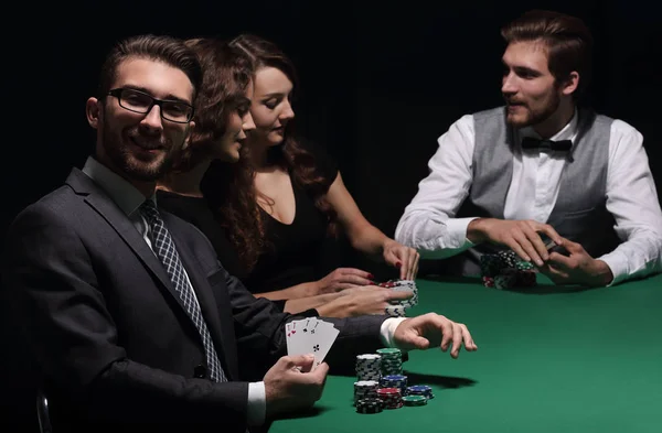 Businessman showing four aces — Stock Photo, Image