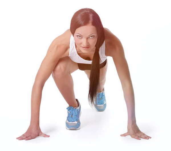 Aantrekkelijke fitness vrouw lage start cross fit oefeningen te doen — Stockfoto