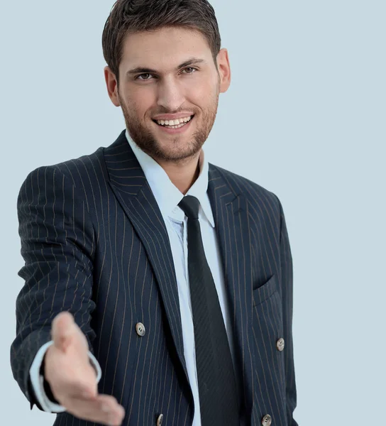 Succesvolle zakenman breidt zijn hand voor een handdruk. — Stockfoto