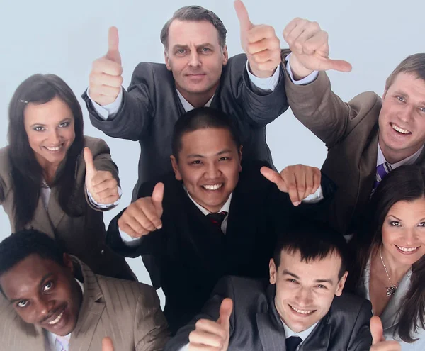 Equipe de negócios multicultural com polegares para cima — Fotografia de Stock