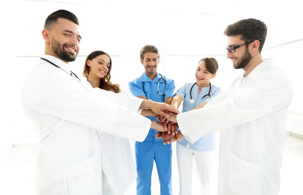 Imagen de fondo de un grupo exitoso de médicos sobre un fondo blanco —  Fotos de Stock