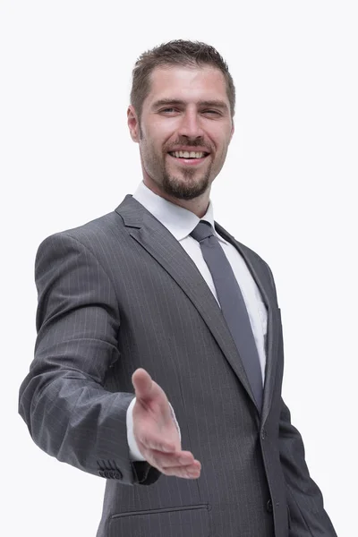 Uomo d'affari sorridente tende la mano per una stretta di mano — Foto Stock