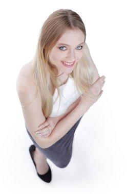 Yukarıdan görüntüleyin. Kameraya bakarak başarılı genç iş kadını.