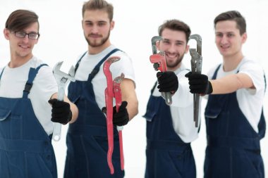 Grup inşaat işçileri ile çalışma araçları