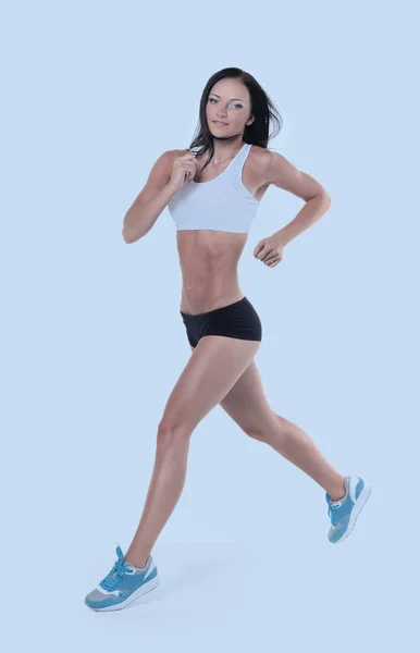 Mulher atraente envolvida em exercício aeróbico — Fotografia de Stock