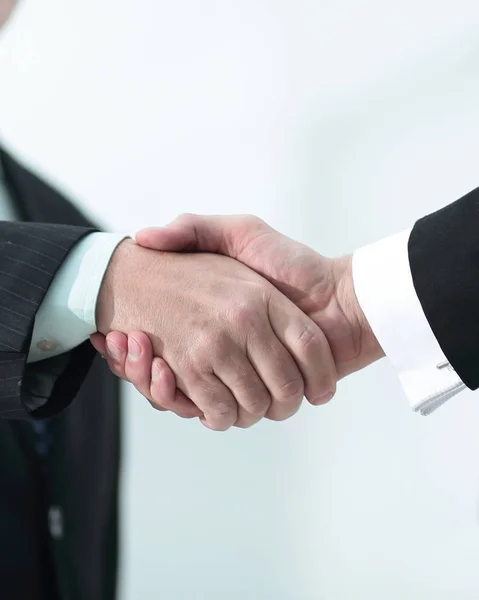 Close-up de um negócio handshake parceiros. a imagem está turva . — Fotografia de Stock