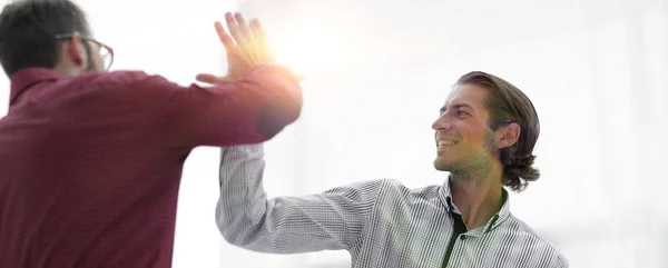 Two business men giving each other a high five. — Stock Photo, Image