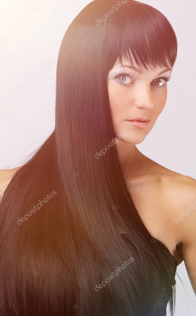 woman close-up isolated on a gray background