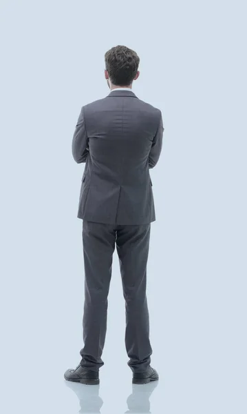 Nézet hátulról, teljes hosszúságú, egy üzletember, állandó, és várja. — Stock Fotó