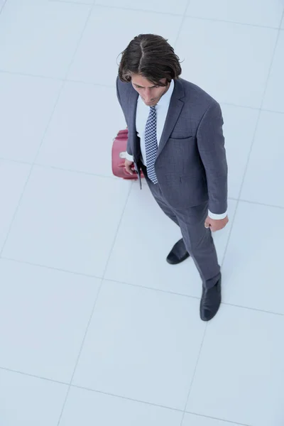 Blick von oben. Geschäftsmann mit Gepäck — Stockfoto