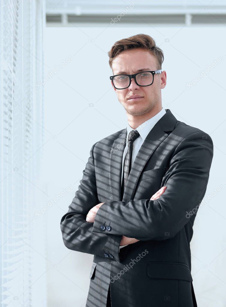 portrait of serious businessman with glasses