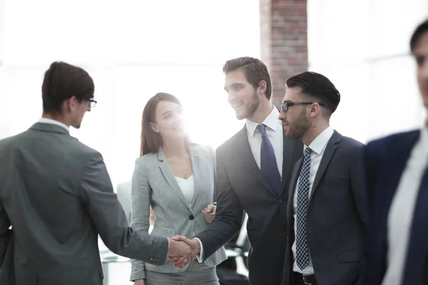 Business people shaking hands in the meeting room — Stock Photo, Image