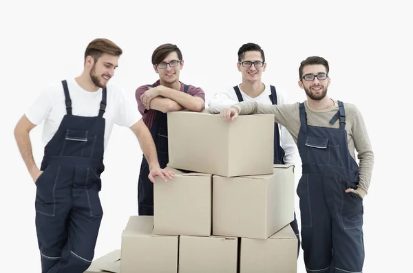 Men holding pile of carton boxes isolated on white background — Stock Photo, Image