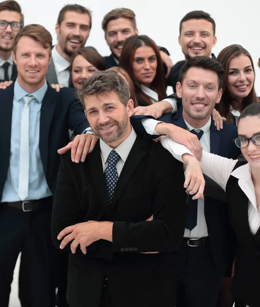 Empresário confiante em pé no fundo de sua equipe de negócios . — Fotografia de Stock