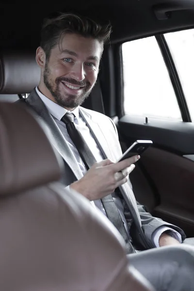 Handsome business man in car. — Stock Photo, Image