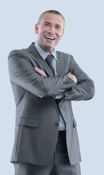 Portrait of a mature smiling business man isolated on white.