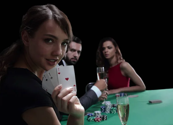 Portrait of the female gambler at the poker table with cards — Stock Photo, Image