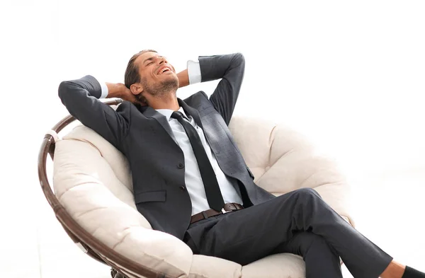 Jonge zakenman mediteren in grote comfortabele fauteuil — Stockfoto