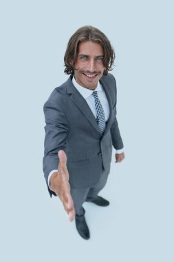 İş adamı el sıkışmak için elini uzatır..