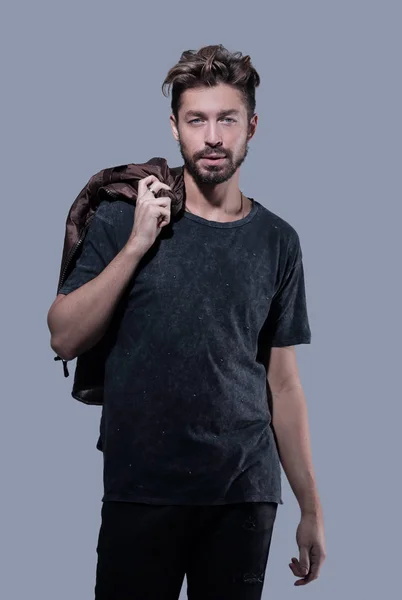 Portrait of a trendy bearded man on a gray background — Stock Photo, Image