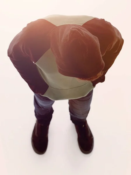 View from above. Hipster in a jacket with a hood looking down — Stock Photo, Image