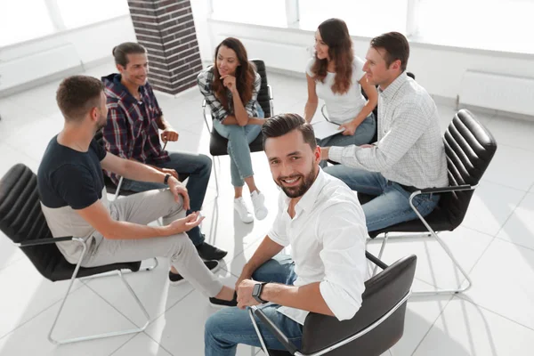 Manager and his team sitting in the office — Stock Photo, Image