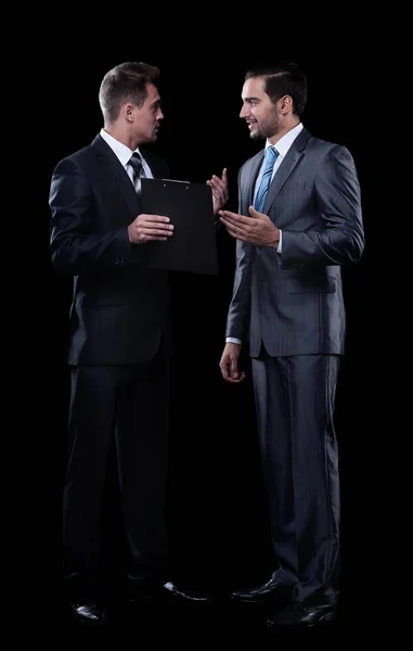 Två affärspartners diskuterar dokument — Stockfoto