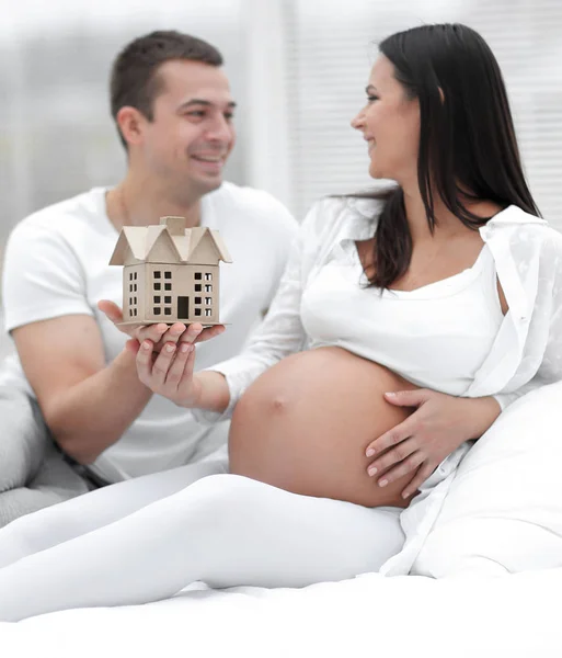 Closeup.Young happy couple dreaming about future home — Stock Photo, Image