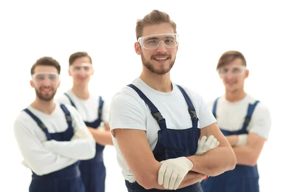 Foreman na zázemí profesionálního týmu — Stock fotografie