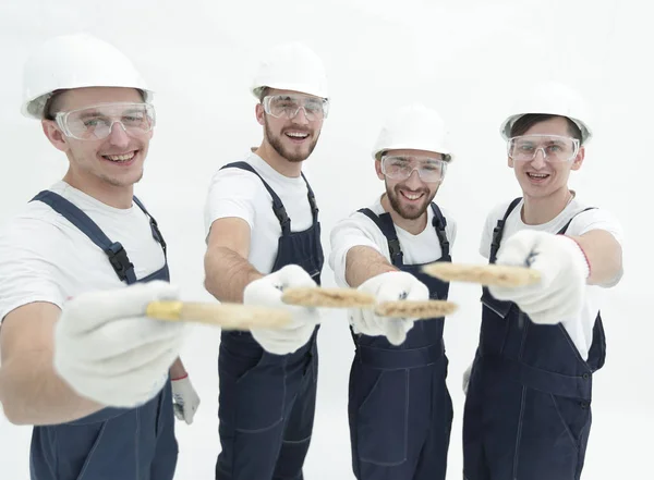 Grupo de trabalhadores da construção .isolated no branco — Fotografia de Stock