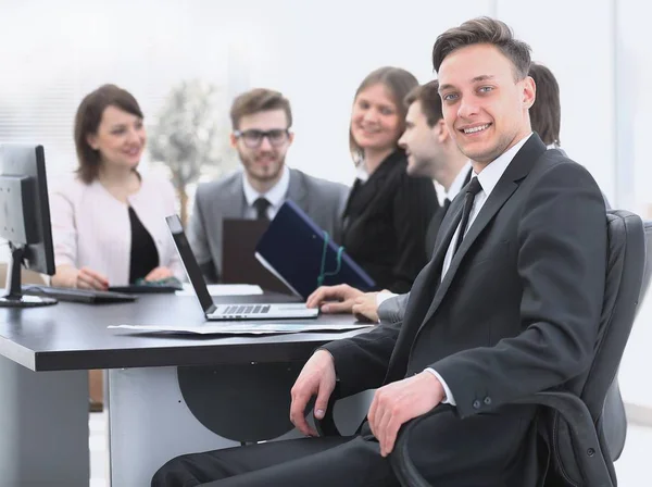 Business team with a senior Manager in the foreground — Stock Photo, Image