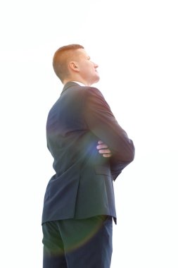 yan görünümü. Kendine güvenen işadamı ararken.