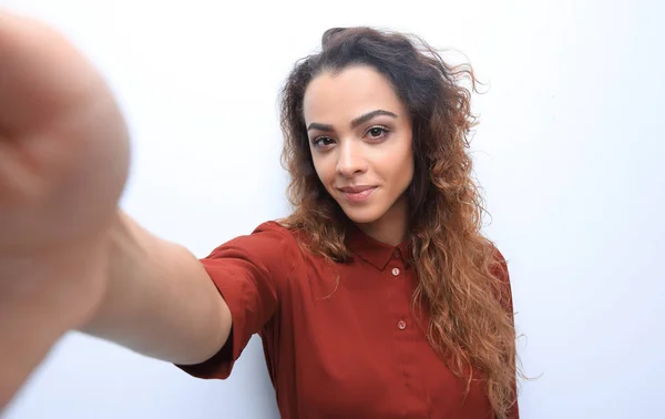 Confident woman leaning on a virtual wall — Stock Photo, Image