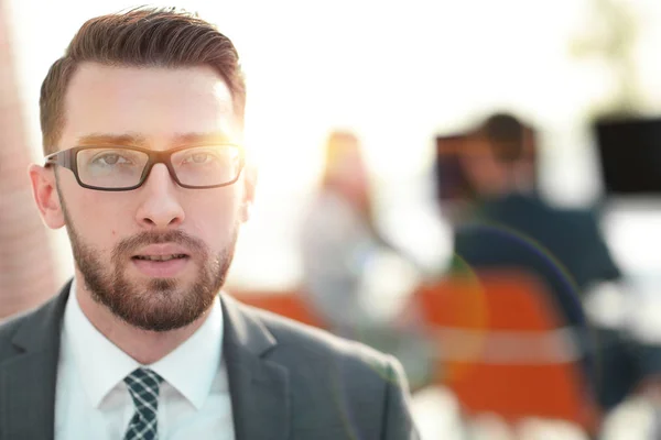 Closeup.Executive businessman on background of office. — Stock Photo, Image