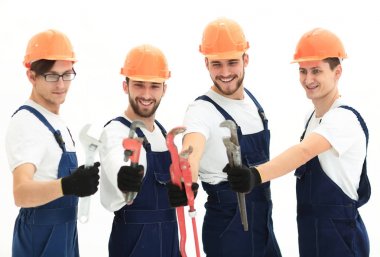 Tesisatçılar çalışma araçları ile grup