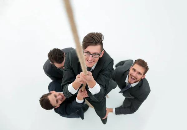 Equipo de negocios ayudando al líder a escalar la cuerda — Foto de Stock