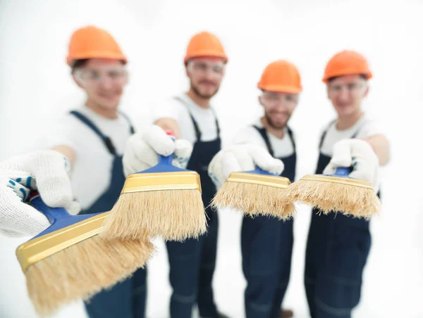 Grupo de constructores con diferentes herramientas — Foto de Stock