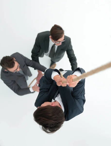 Pohled shora .business tým pomáhá vůdce vylézt nahoru. — Stock fotografie