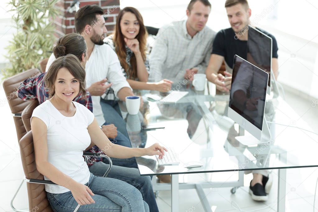 group of young employees discussing ideas