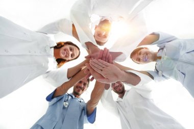 Alt görünümü. kapatmak yukarıya-in bir doktorlar birlikte ellerini katlanmış