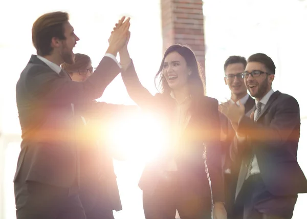Successful woman leading a business group and looking happy. — Stock Photo, Image