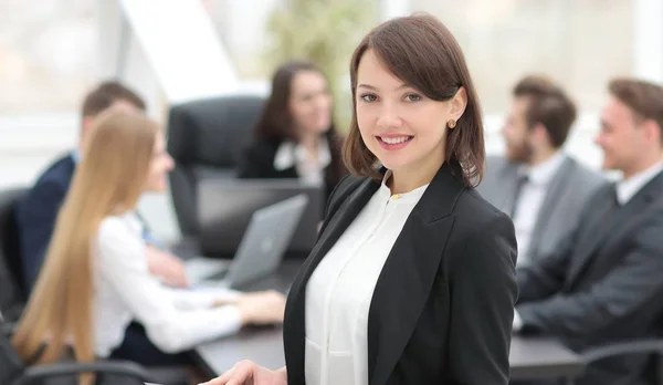 Confident young business woman with documents — Stock Photo, Image