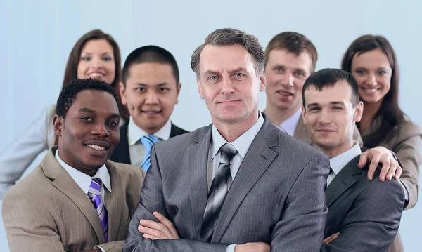 Affärsmannen och sammanhängande business-team — Stockfoto