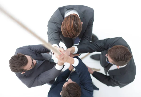 Vista da equipe top.business escalando a corda — Fotografia de Stock