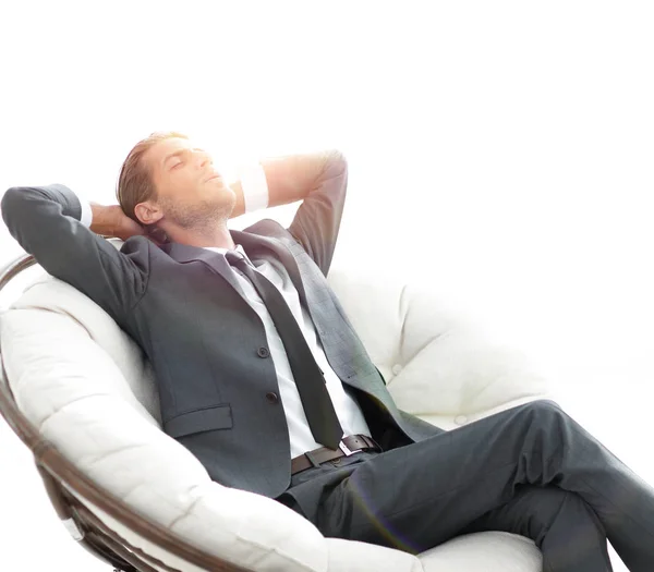 Joven hombre de negocios meditando en gran sillón cómodo —  Fotos de Stock