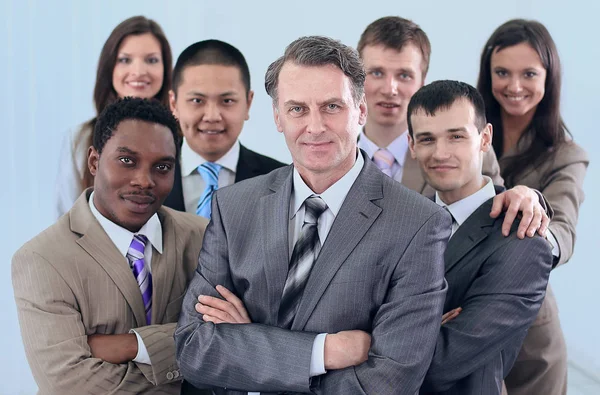 Hombre de negocios y equipo empresarial cohesivo — Foto de Stock