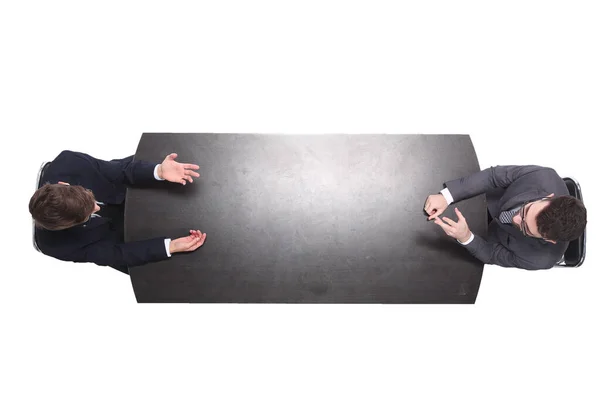 Επάνω όψη. δύο επιχειρηματικοί άνθρωποι που συζητούν κάτι σε μια συνάντηση — Φωτογραφία Αρχείου