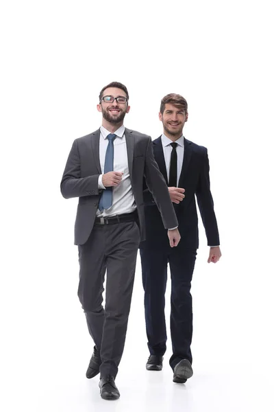 En pleno crecimiento. dos hombres de negocios dando un paso adelante . — Foto de Stock