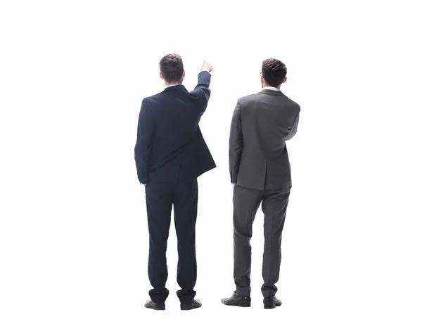 Vista trasera. dos hombres de negocios mirando el espacio de copia — Foto de Stock