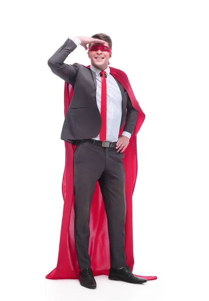 Attentive superhero businessman looking into the distance — Stock Photo, Image